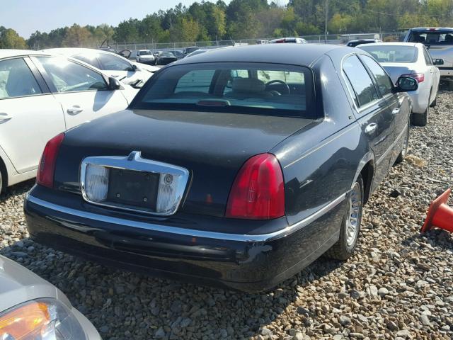 1LNFM83W9XY607003 - 1999 LINCOLN TOWN CAR C BLACK photo 4