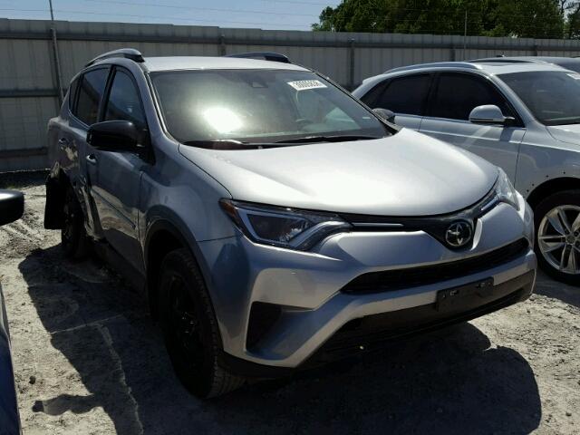 2T3ZFREV4HW395046 - 2017 TOYOTA RAV4 LE SILVER photo 1