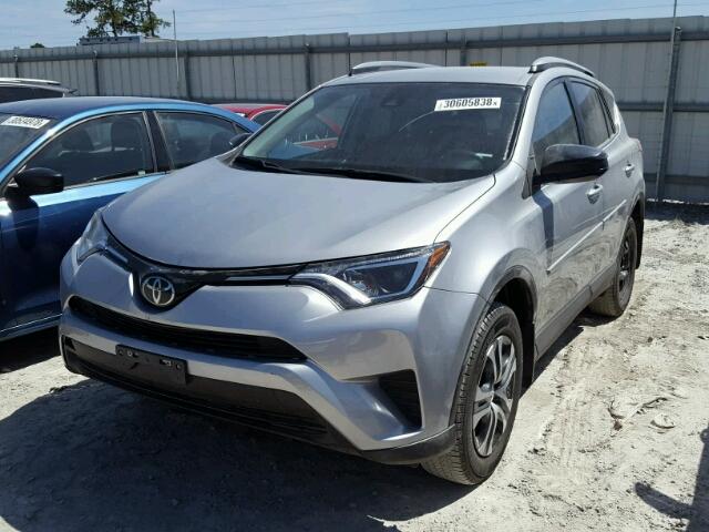 2T3ZFREV4HW395046 - 2017 TOYOTA RAV4 LE SILVER photo 2