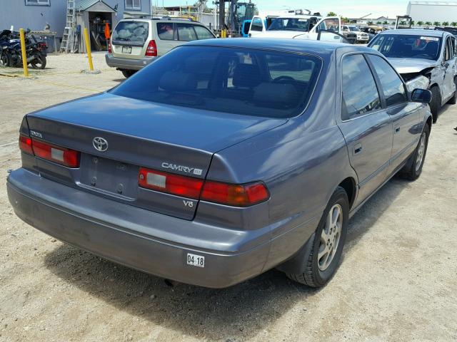 JT2BF22KXV0063415 - 1997 TOYOTA CAMRY LE GRAY photo 4