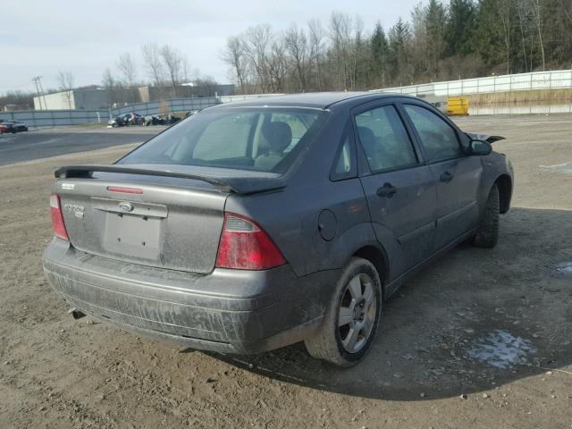 1FAFP34NX7W225830 - 2007 FORD FOCUS ZX4 GRAY photo 4