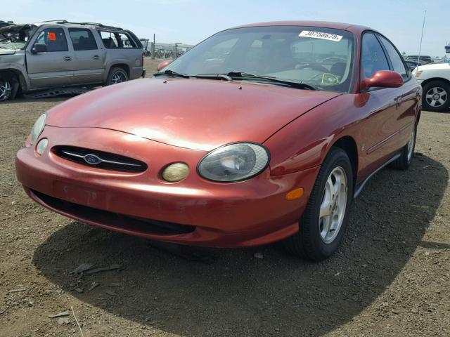 1FAFP53S8XA317518 - 1999 FORD TAURUS SE RED photo 2