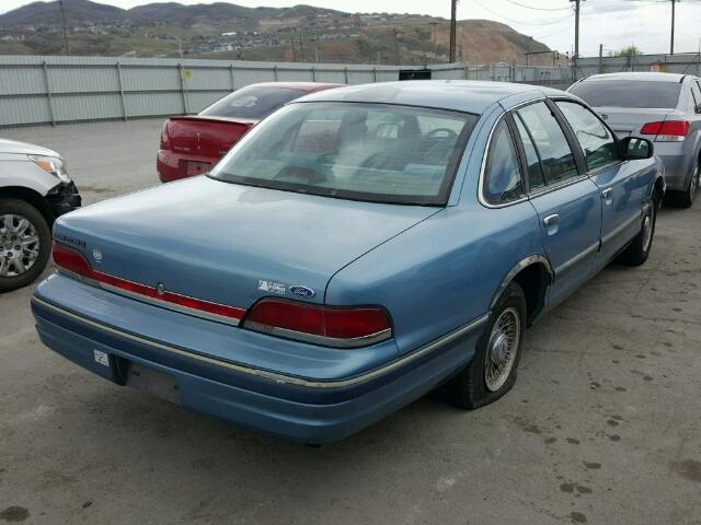 2FACP74W8PX110229 - 1993 FORD CROWN VICT BLUE photo 4
