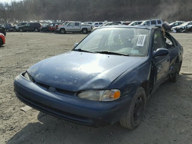 1Y1SK5288XZ416155 - 1999 CHEVROLET GEO PRIZM TURQUOISE photo 2