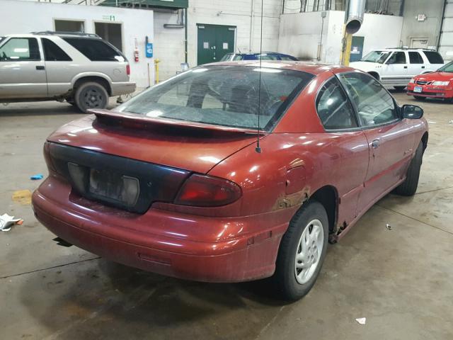 1G2JB124XW7591155 - 1998 PONTIAC SUNFIRE SE ORANGE photo 4