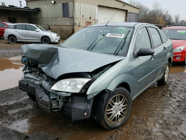 1FAFP34N25W289471 - 2005 FORD FOCUS ZX4 GREEN photo 2