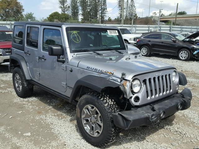 1C4BJWFG9GL118828 - 2016 JEEP WRANGLER U GRAY photo 1