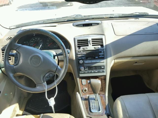 JN1CA31D01T839095 - 2001 NISSAN MAXIMA GXE GOLD photo 9