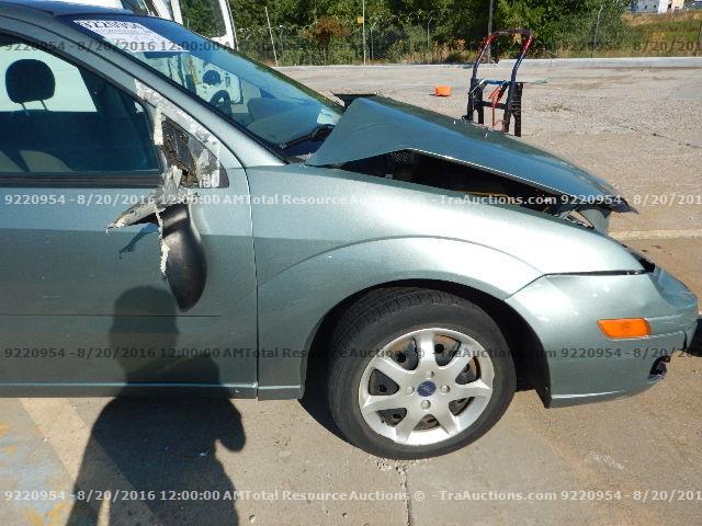 1FAFP34N95W307559 - 2005 FORD FOCUS ZX4 GREEN photo 14