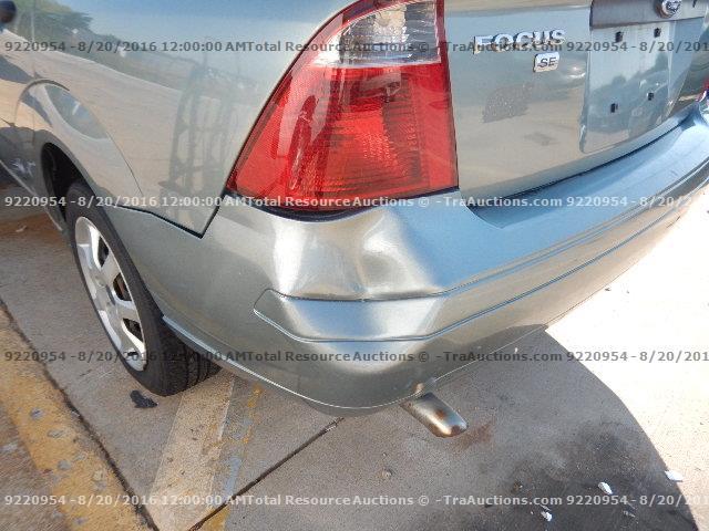 1FAFP34N95W307559 - 2005 FORD FOCUS ZX4 GREEN photo 17