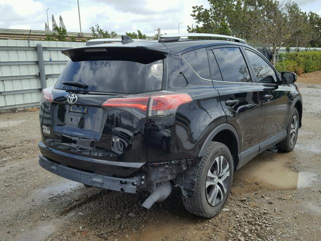 2T3ZFREV5GW297626 - 2016 TOYOTA RAV4 LE BLACK photo 4