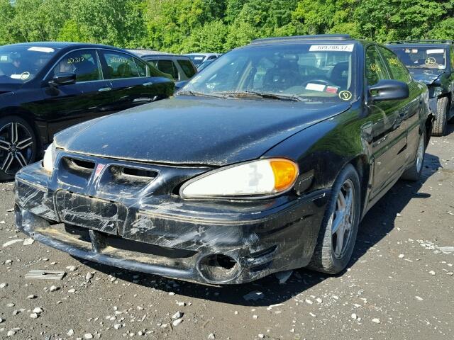 1G2NV52E81C101787 - 2001 PONTIAC GRAND AM G BLACK photo 2