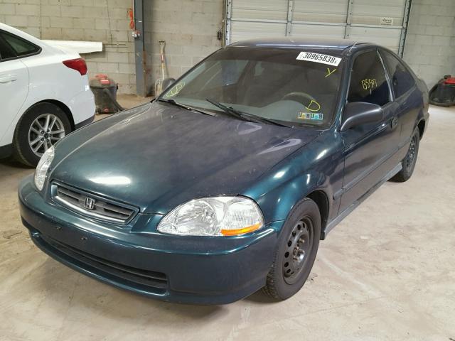 1HGEJ6220VL094585 - 1997 HONDA CIVIC DX GREEN photo 2