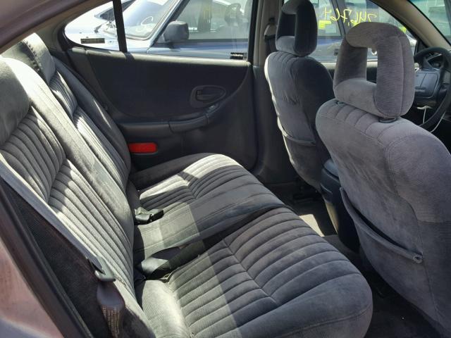 1G2WP52K5XF284173 - 1999 PONTIAC GRAND PRIX GRAY photo 6