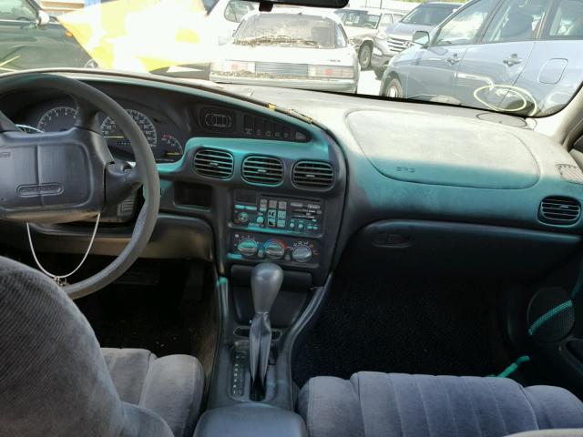 1G2WP52K5XF284173 - 1999 PONTIAC GRAND PRIX GRAY photo 9