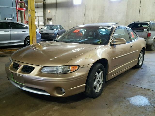1G2WP12K6XF318209 - 1999 PONTIAC GRAND PRIX GOLD photo 2
