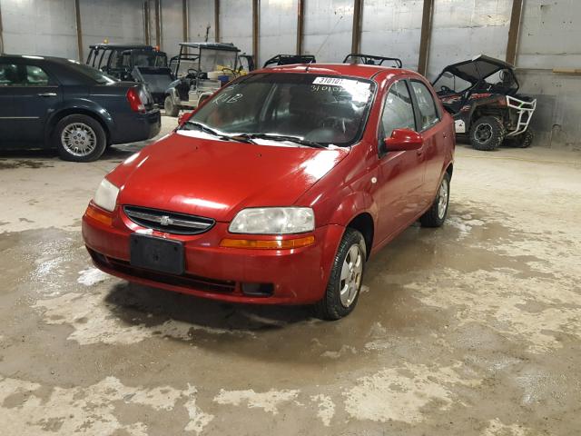 KL1TD56696B657393 - 2006 CHEVROLET AVEO BASE Czerwony zdjęcie 2