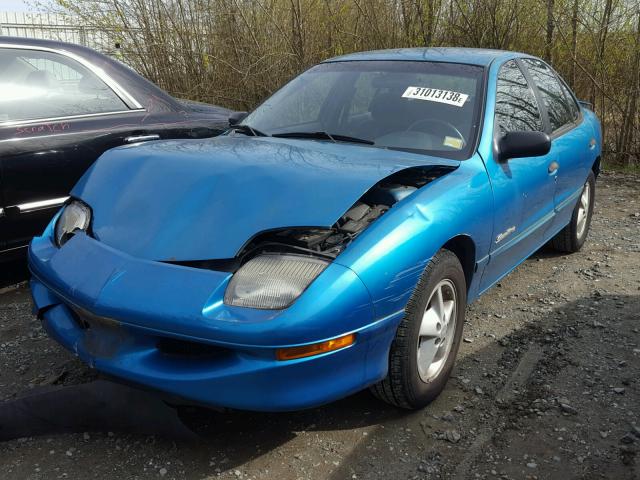 1G2JB524XX7569763 - 1999 PONTIAC SUNFIRE SE TEAL photo 2