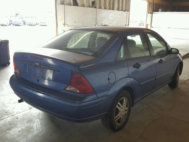 1FAFP34P03W254636 - 2003 FORD FOCUS SE BLUE photo 4