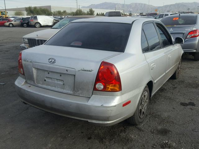 KMHCG45CX3U490863 - 2003 HYUNDAI ACCENT SILVER photo 4