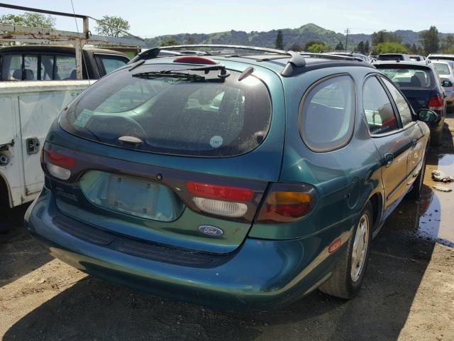 1FALP57U3TG145968 - 1996 FORD TAURUS GL GREEN photo 4