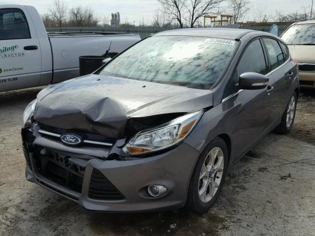 1FAHP3M25CL244361 - 2012 FORD FOCUS SEL SILVER photo 2