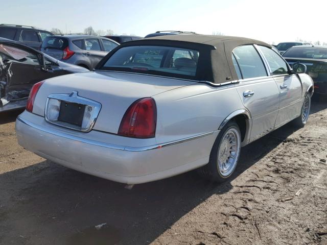 1LNHM83W3YY928139 - 2000 LINCOLN TOWN CAR C CREAM photo 4