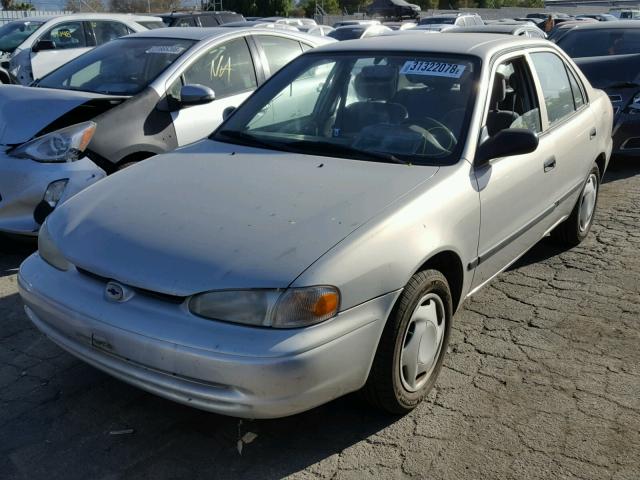 1Y1SK5483XZ402063 - 1999 CHEVROLET GEO PRIZM WHITE photo 2