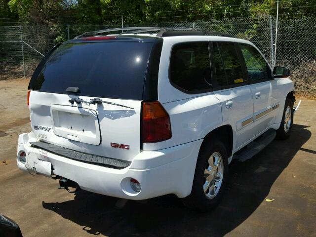 1GKDT13S452325651 - 2005 GMC ENVOY WHITE photo 4