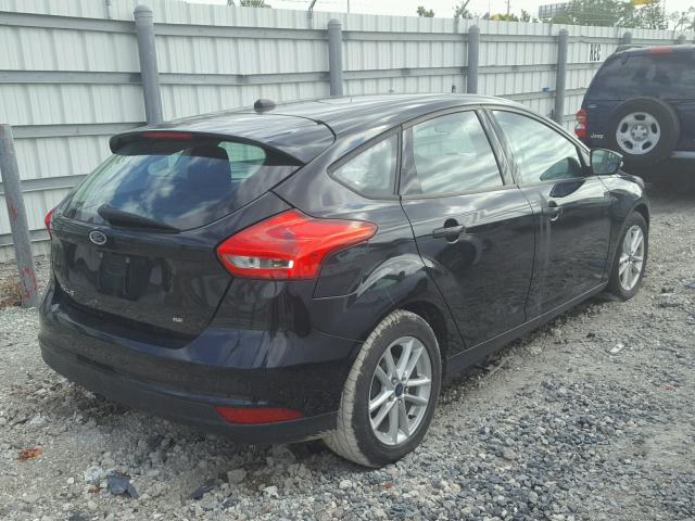 1FADP3K20FL328710 - 2015 FORD FOCUS SE BLACK photo 4