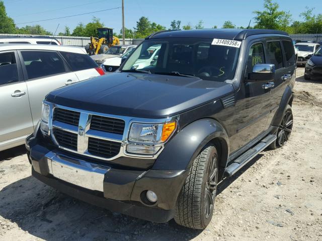 1D4PU5GXXAW124605 - 2010 DODGE NITRO SXT BLACK photo 2