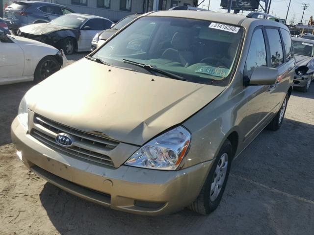 KNDMG4C39A6354074 - 2010 KIA SEDONA LX GOLD photo 2