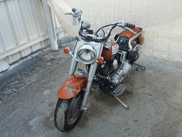 1HD1BMY13YY032634 - 2000 HARLEY-DAVIDSON FLSTF ORANGE photo 2