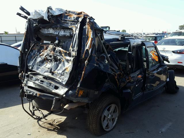 1J8HH48N86C253814 - 2006 JEEP COMMANDER BLACK photo 4