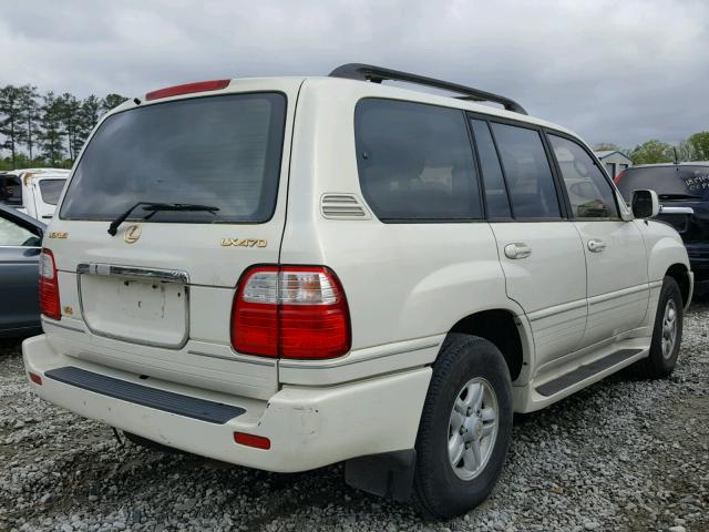 JT6HT00W9X0070080 - 1999 LEXUS LX 470 WHITE photo 4