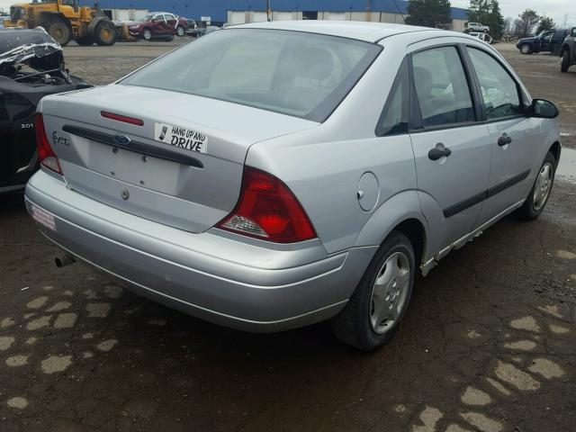 1FAFP33P74W117910 - 2004 FORD FOCUS LX SILVER photo 4