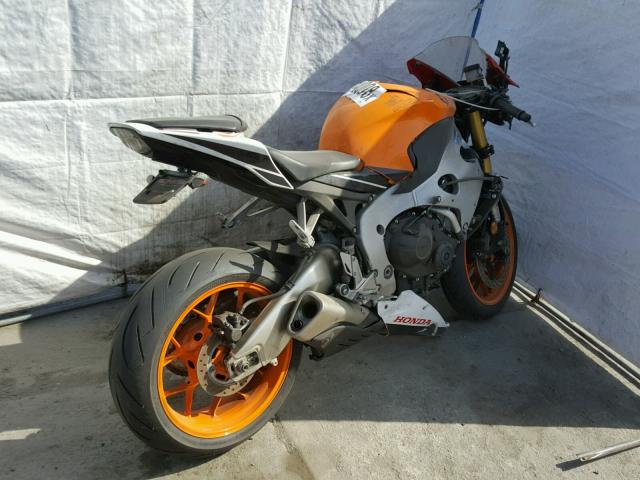 JH2SC5916FK700070 - 2015 HONDA CBR1000 RR ORANGE photo 4