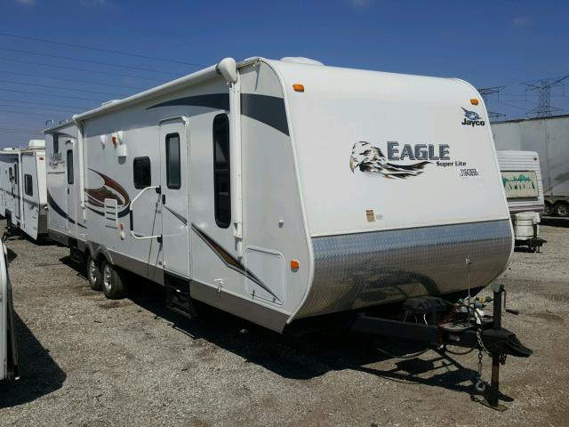 1UJBJ0BS3B1DJ0390 - 2011 JYCO EAGLE WHITE photo 1