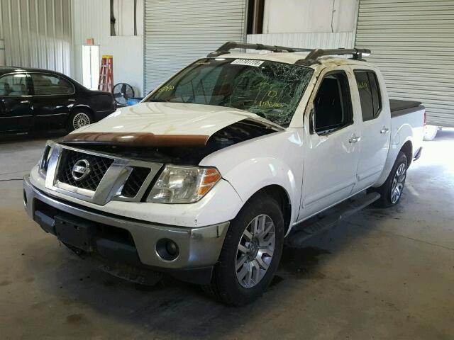 1N6AD07U79C418680 - 2009 NISSAN FRONTIER C WHITE photo 2