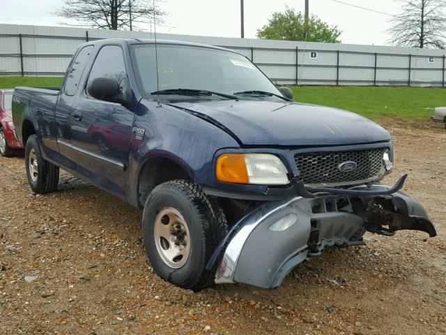 2FTRX18W74CA84253 - 2004 FORD F-150 HERI BLUE photo 1