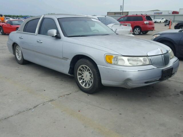 1LNHM82W4XY611633 - 1999 LINCOLN TOWN CAR S GRAY photo 1