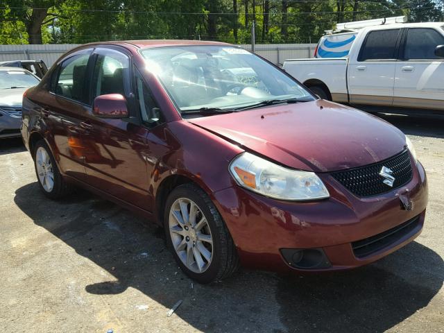 JS2YC5A23B6303285 - 2011 SUZUKI SX4 LE BURGUNDY photo 1