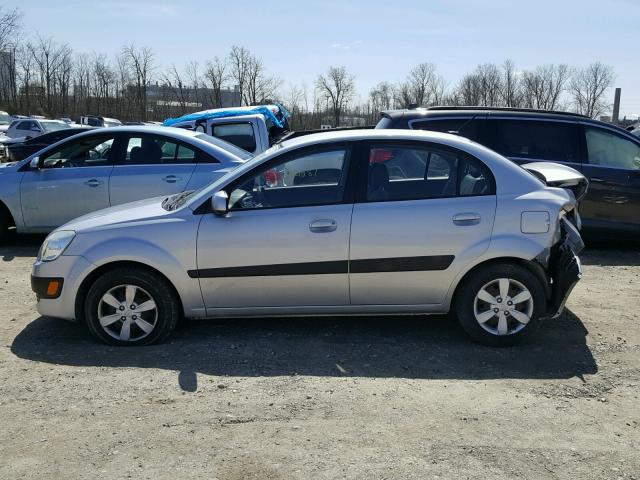 KNADE223496548967 - 2009 KIA RIO BASE SILVER photo 9