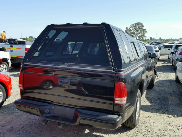 1B7GL22Y1XS303985 - 1999 DODGE DAKOTA BLACK photo 4