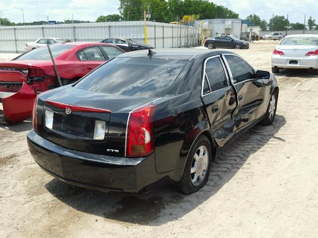 1G6DM577X40110536 - 2004 CADILLAC CTS BLACK photo 4