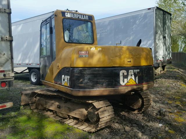 CAT0307CJBAJ00718 - 2002 CATE BACKHOE YELLOW photo 3