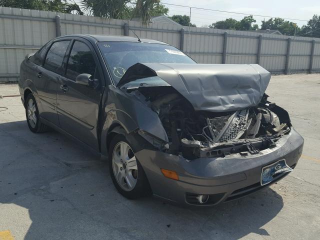 1FAFP38Z55W126259 - 2005 FORD FOCUS ZX4 GRAY photo 1