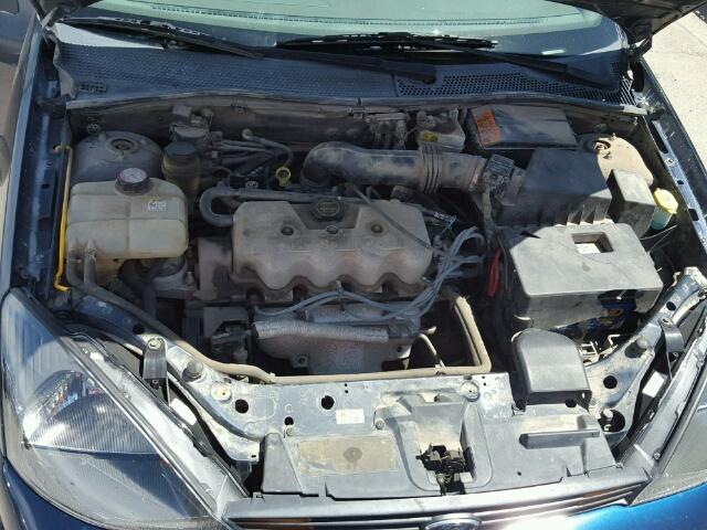 1FAHP33P94W124396 - 2004 FORD FOCUS LX BLUE photo 7