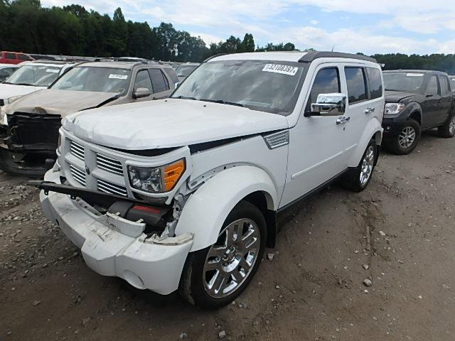 1D4PT4GX7BW528847 - 2011 DODGE NITRO HEAT WHITE photo 2