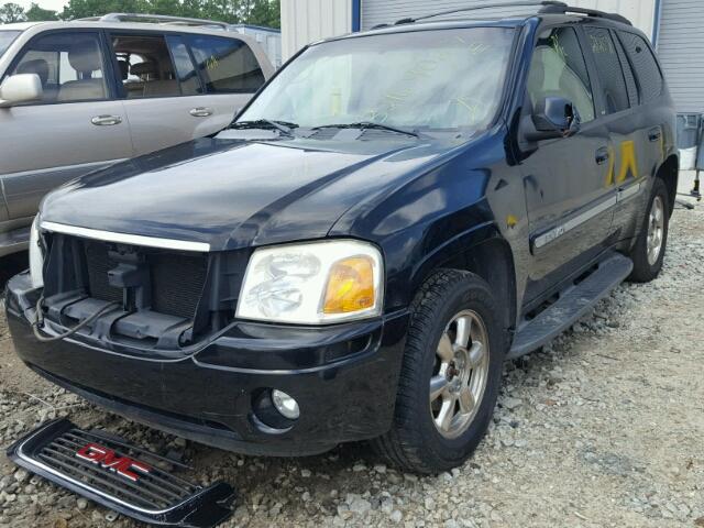 1GKDT13SX22429928 - 2002 GMC ENVOY BLACK photo 2